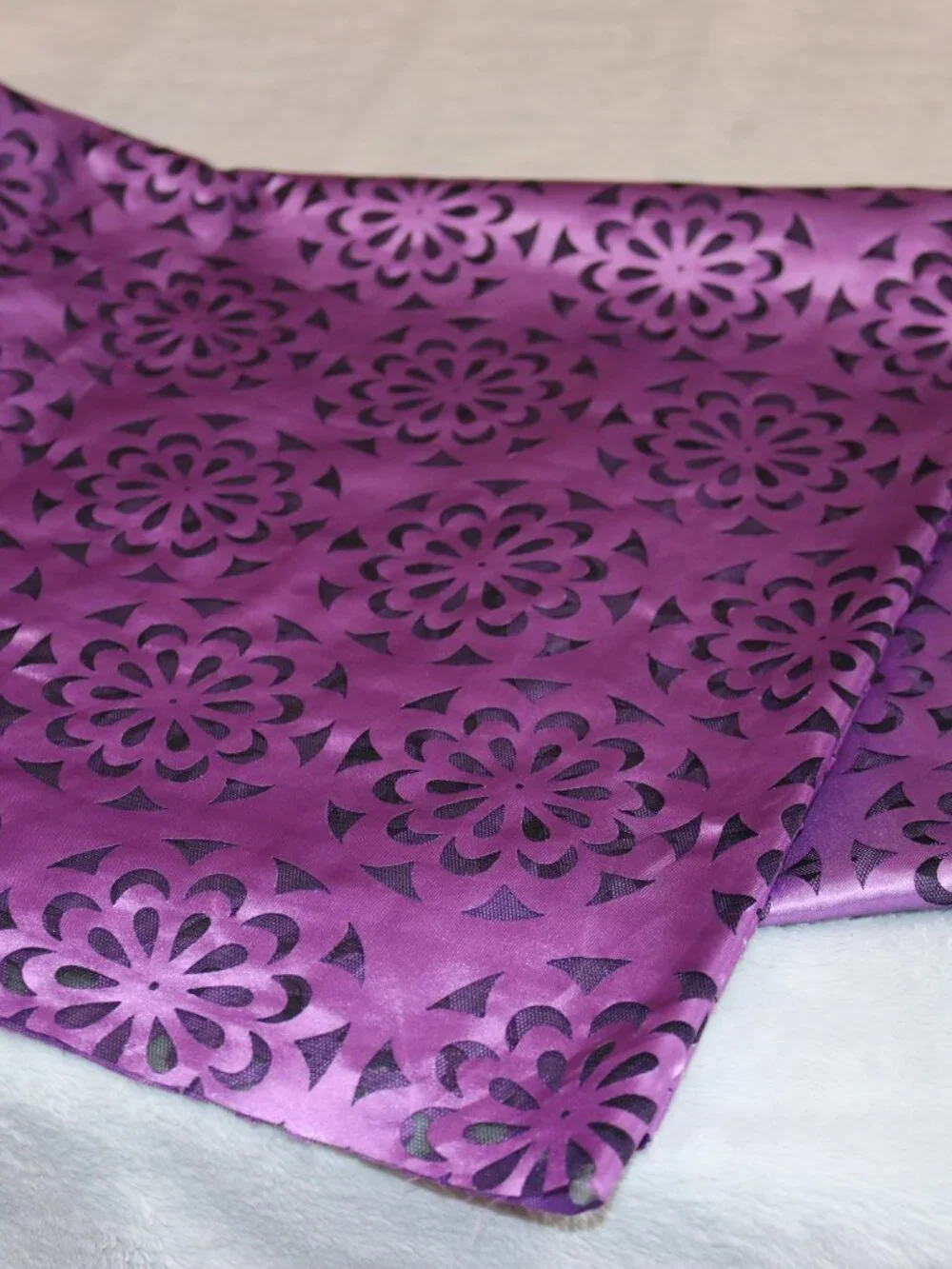 Purple and black satin and lace tablecloth. 61 x 70.